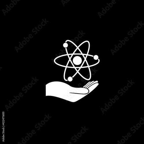 Atom in hand icon isolated on dark background