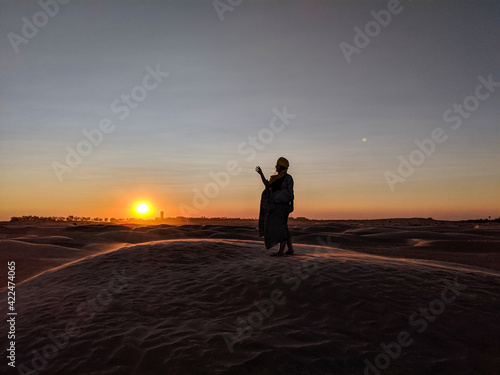 Young girl posing in the desert of Tunisia