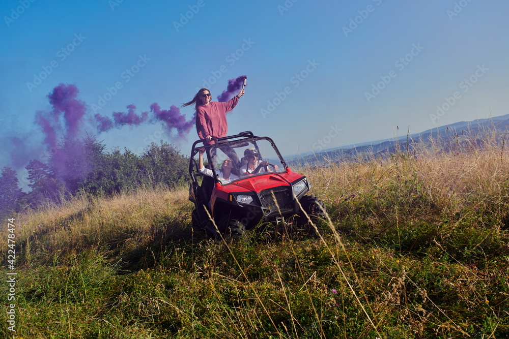  colorful torches while driving a off road buggy car