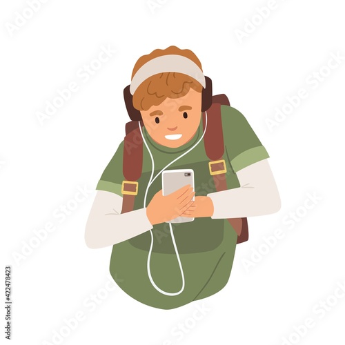 Young student in headphones listening to music using mobile phone. Happy teenager holding smartphone and looking at screen. Flat vector illustration man with cellphone isolated on white background