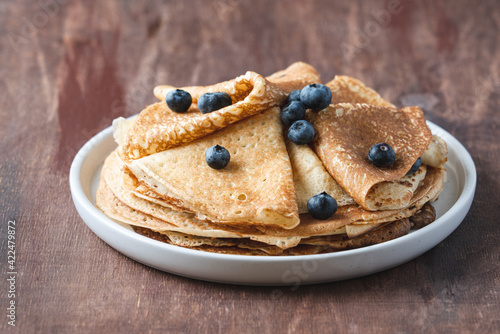 Homemade thin pancakes. Traditional Russian or Ukrainian homemade fried crepes