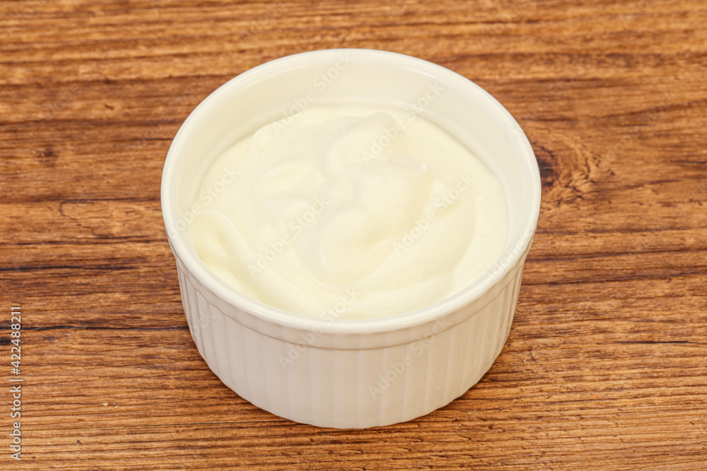 Sour cream in the bowl