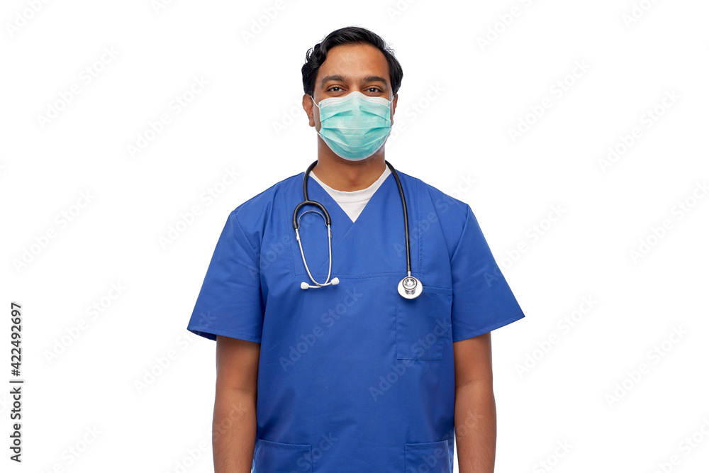 indian male doctor in blue uniform and mask indian male doctor in blue uniform and mask