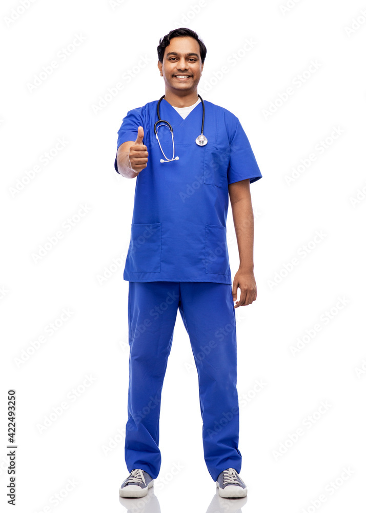 indian doctor or male nurse showing thumbs up indian doctor or male nurse showing thumbs up