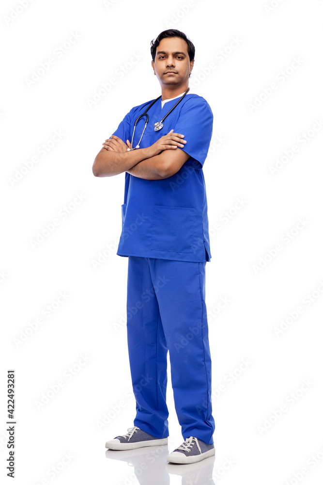 indian doctor or male nurse in blue uniform indian doctor or male nurse in blue uniform