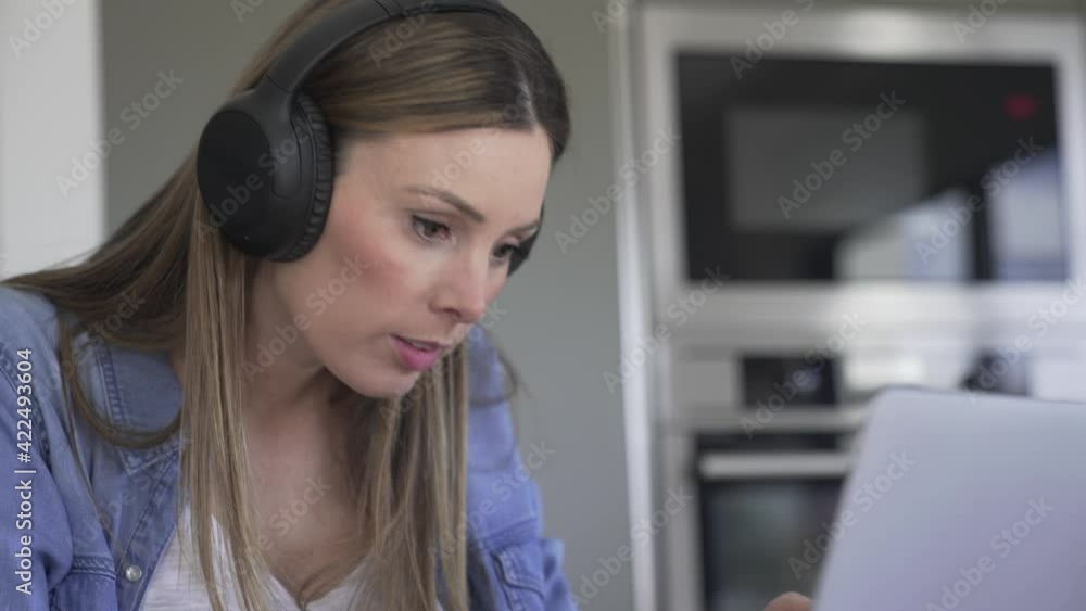 Woman working from home with laptop Woman working from home with laptop