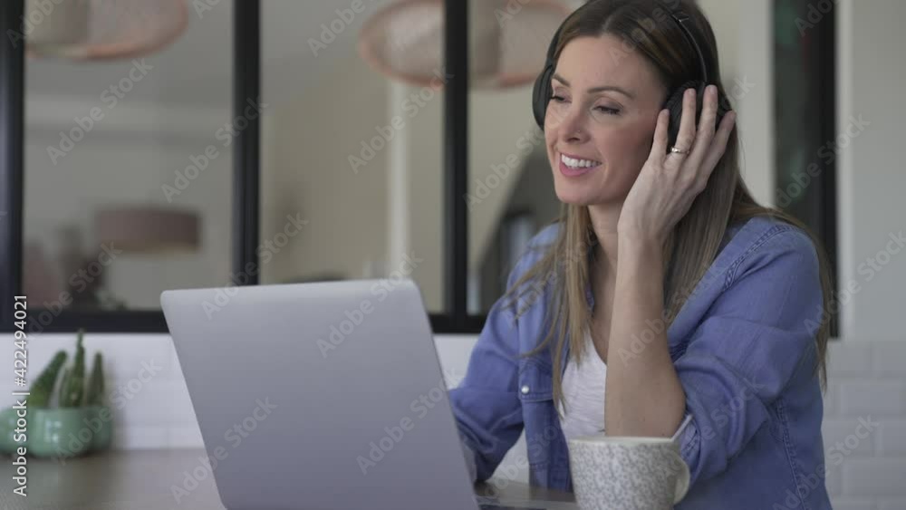 Woman working from home with laptop Woman working from home with laptop