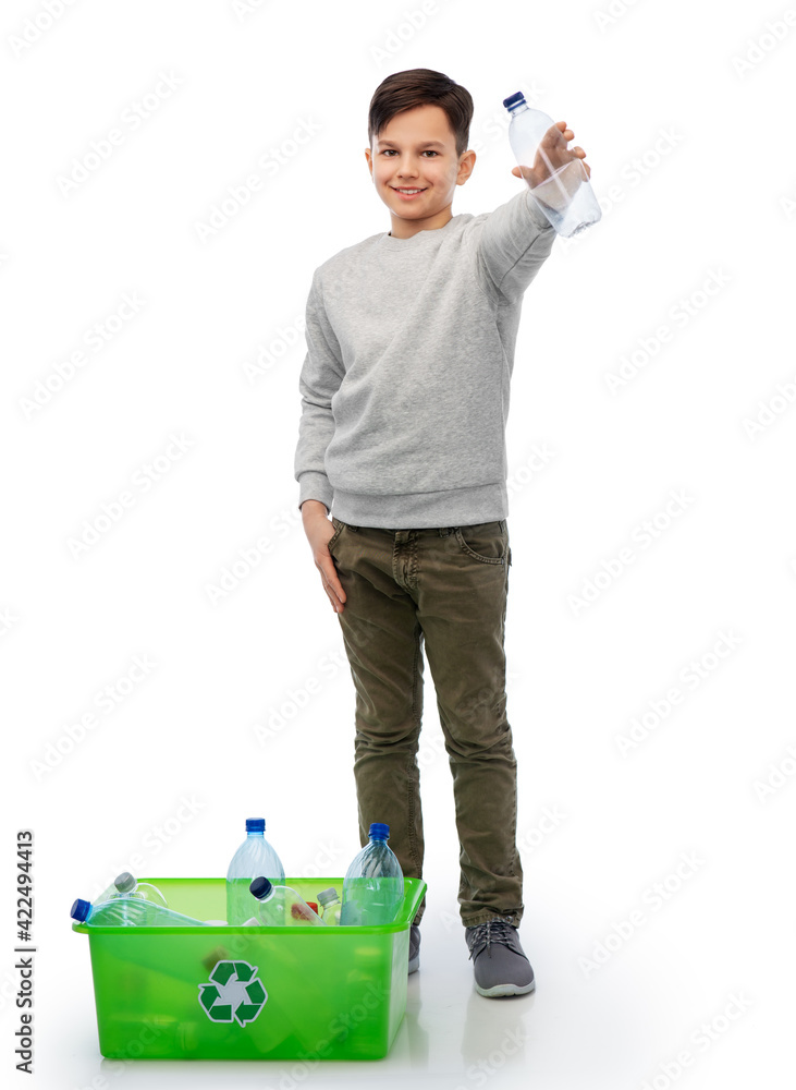 smiling boy sorting plastic waste smiling boy sorting plastic waste