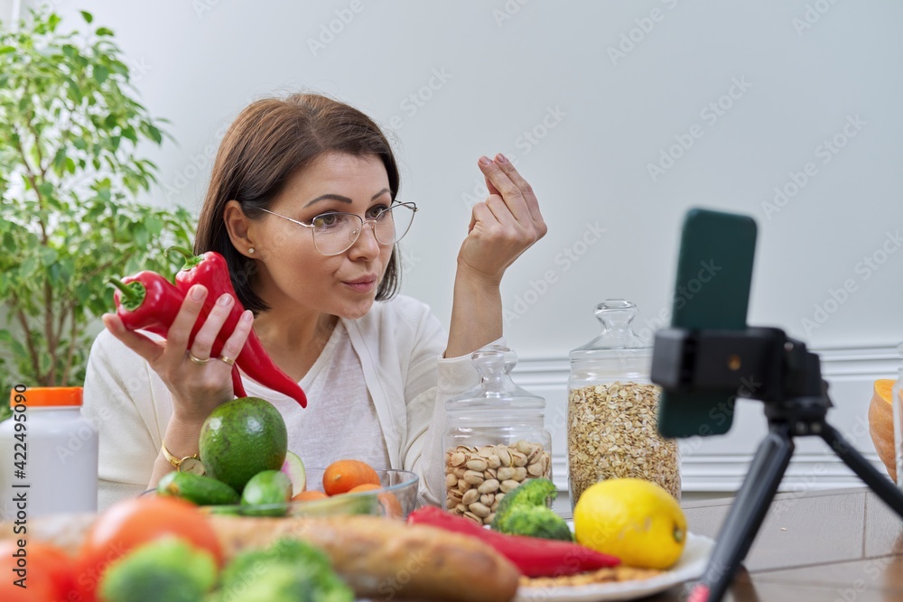 Specialist leading stream, blog about healthy eating, using smartphone Specialist leading stream, blog about healthy eating, using smartphone