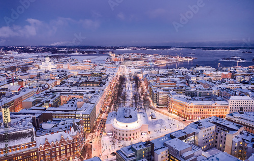 Aerial view of Esplanade park with Christmas decoration. Aerial view of snow-covered Helsinki, Finland.