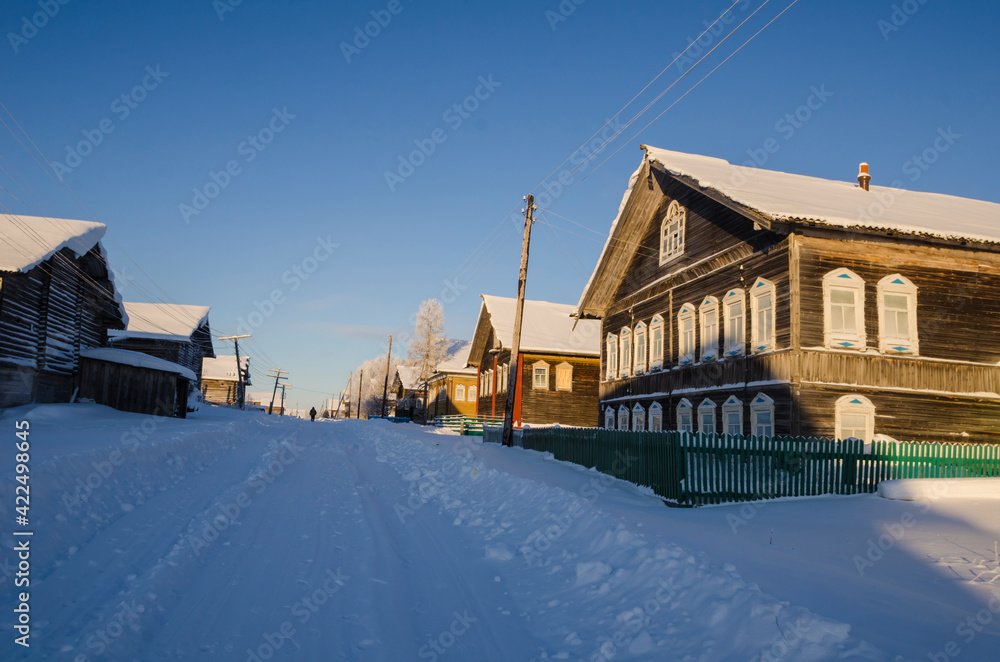 North Pomeranian village. Large wooden houses made of logs. Russia, Arkhangelsk region, Mezensky district, Kiltsa village 