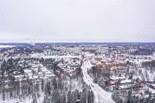 Obraz na płótnie Aerial view of Matinkyla neighborhood of Espoo, Finland. Snow-covered city in winter. w salonie