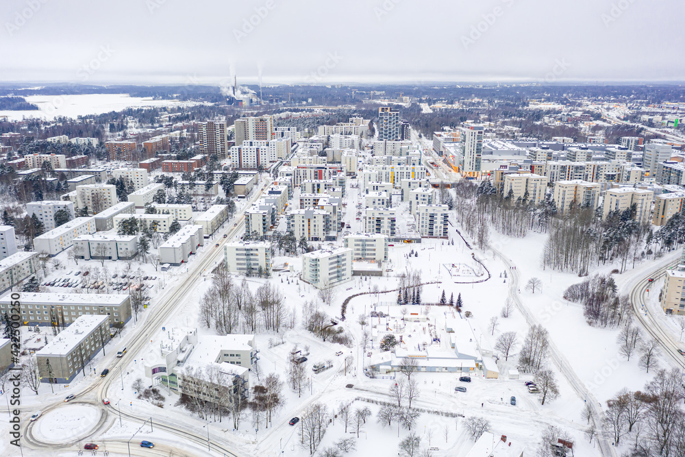 Aerial view of Matinkyla neighborhood of Espoo, Finland. Snow-covered city in winter.