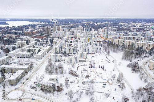 Obraz na płótnie Aerial view of Matinkyla neighborhood of Espoo, Finland. Snow-covered city in winter. w salonie