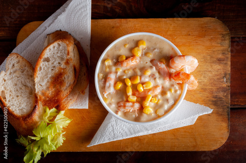 Homemade clam chowder with shrimp, top view.