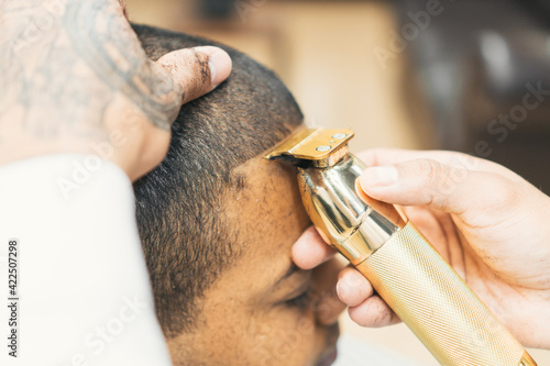 Hairdressing and barbershop, artistic and youthful cutting styles.