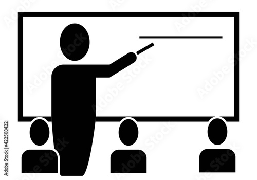 Enseñanza presencial. Profesor explicando a los alumnos en una clase presencial