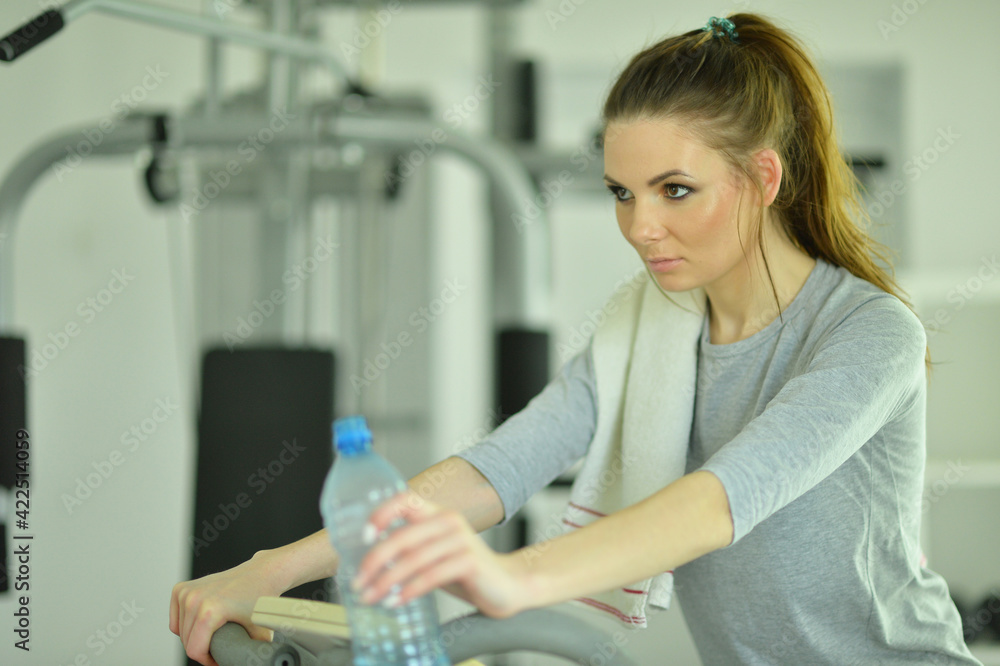 Sporty young woman training in gym Sporty young woman training in gym