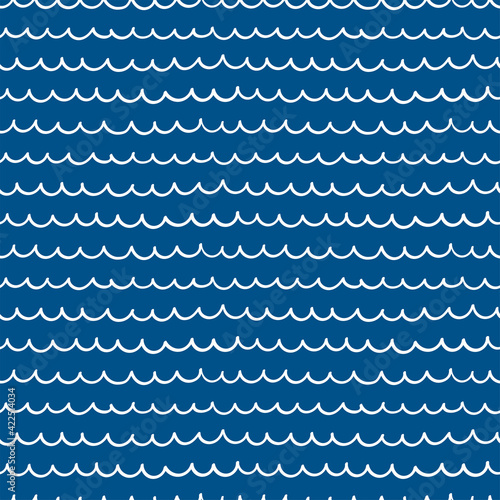 White waves simple childish nautical seamless pattern on blue background. Hand drawn vector illustration. Scandinavian style line drawing. Design concept for kids textile, fashion print, wallpaper