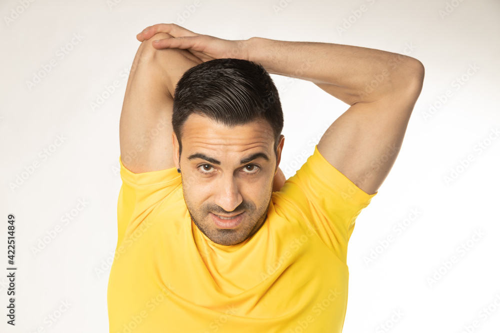 athlete man stretching exercises on white background. athlete man stretching exercises on white background.