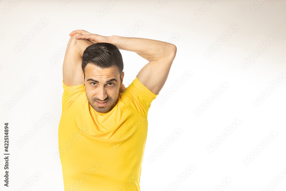athlete man stretching exercises on white background. athlete man stretching exercises on white background.