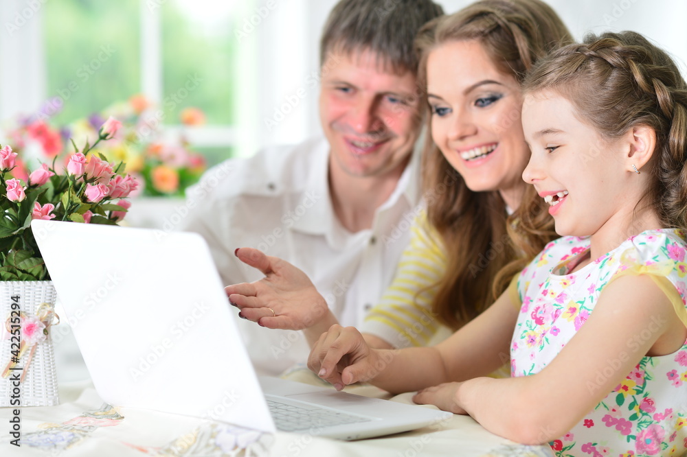 girl with mother and father drawing at home girl with mother and father drawing at home