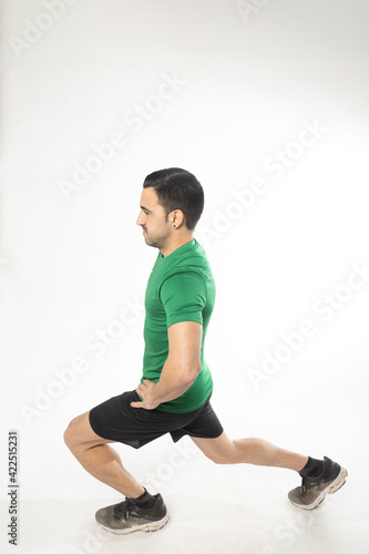 athlete man stretching exercises on white background.