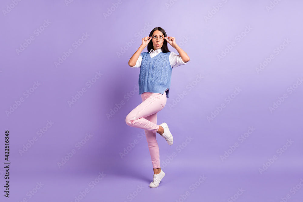 Full length body size view of attractive amazed funky girl jumping touching specs wow isolated over purple violet color background