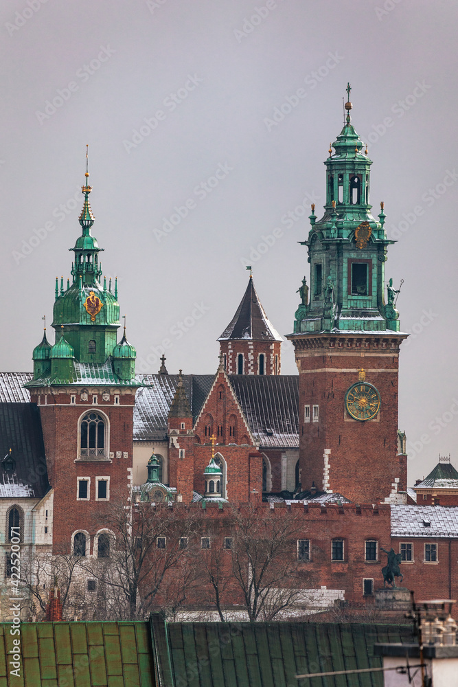 Fototapeta premium Krakow old town photographed in March. Dynamic weather created interesting conditions for shooting.