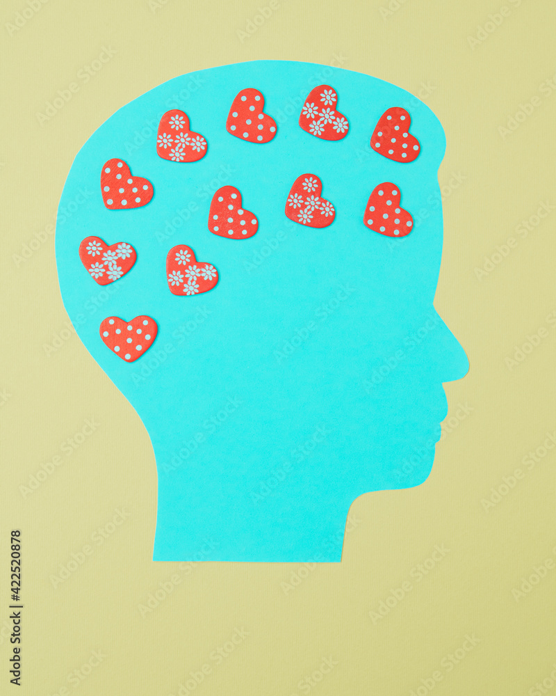 Man in love. Concept of Valentines day on yellow baskground, head that thinks of love. Man in love. Concept of Valentines day on yellow baskground, head that thinks of love.