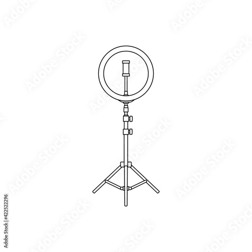 Led ring lamp on tripod with smartphone. Contour isolated vector image on white background.