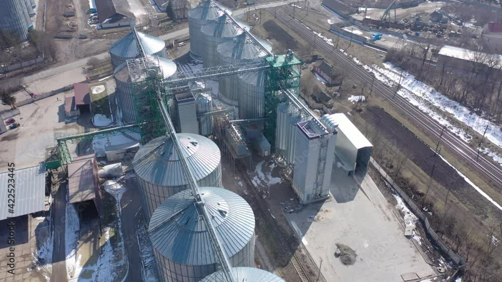 Grain elevator business with large storage bins of corn, grain, soybean