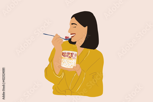 Pretty woman in yellow bathrobe enjoys breakfast in the morning, eating granola in glass with raspberry. Vector illustration. Health concept.