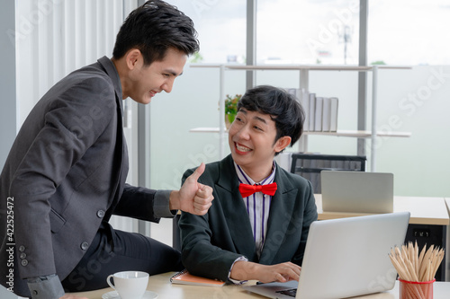 Wallpaper Mural Group of young business people sit at their desks with smiling colleagues together in the office.  Meeting business people  planning concept, laptop meeting ideas. Concentrate on work. LGBT teamwork. Torontodigital.ca