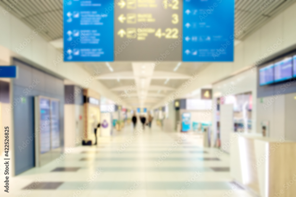 airport background. defocused blurred transition between gates and terminals inside a modern airport airport background. defocused blurred transition between gates and terminals inside a modern airport