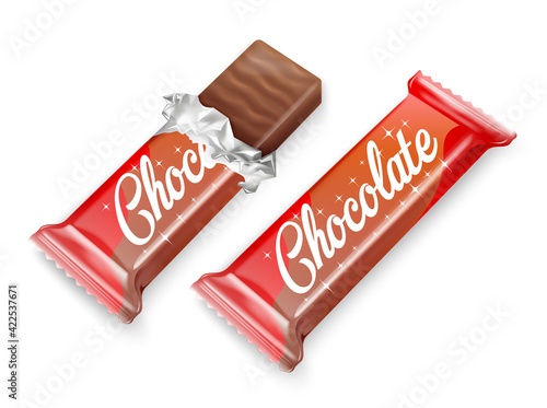 Chocolate bar or waffle in chocolate in opened red wrapped and foil