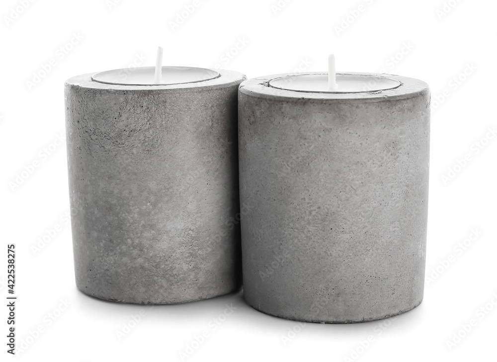 Candles in holders on white background Candles in holders on white background