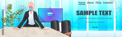 businesswoman wearing protective mask to prevent coronavirus successful business woman working in office