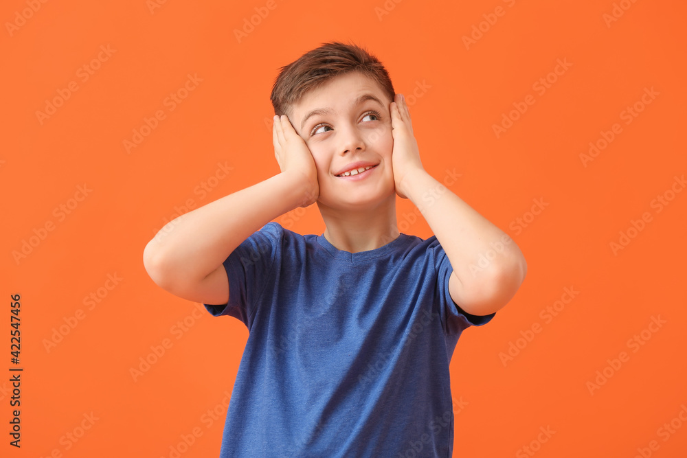 Happy little boy on color background Happy little boy on color background