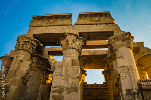 Ruins of the Temple of Kom Ombo in the Nile river at sunset, Egypt at dawn. photo