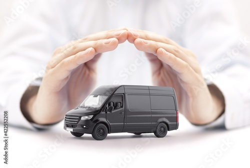 Transport black van car protected by hands