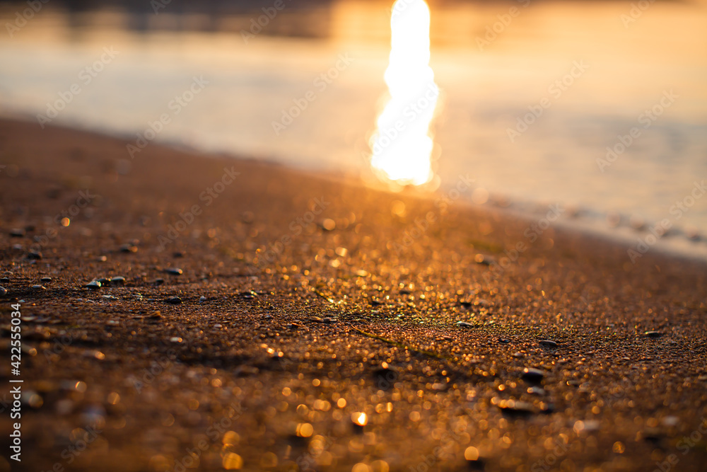 A ray of sun on the golden sand A ray of sun on the golden sand