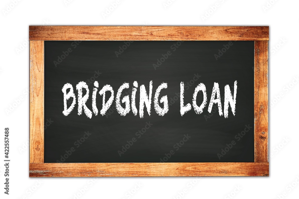 BRIDGING LOAN text written on wooden frame school blackboard. BRIDGING LOAN text written on wooden frame school blackboard.