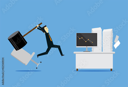 Angry boss smashed the computer on the desk