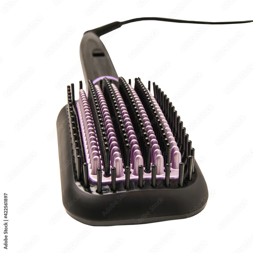 Electric thermo hair straightening brush with ceramic coating insulated on  a white background Stock Photo | Adobe Stock