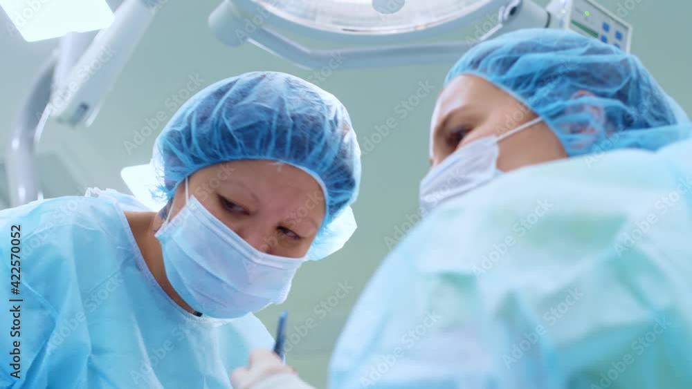 the surgeon performs a surgical operation the surgeon performs a surgical operation