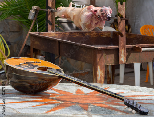 Quadro su tela The national Greek stringed plucked musical instrument Bouzouki lies on a marble