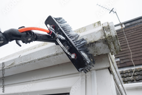 Cleaned white plastic pvc gutters and drain pipes that were blocked and full of green mould on the plastic fascias.  Blocked drains and guttering need cleaning and regular maintenance for drainage