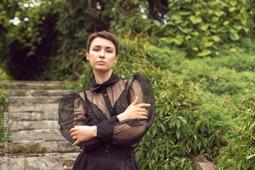 Girl with short hair in the park