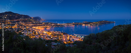 French Riviera in Summer at twilight with Villefranche-sur-Mer, Saint-Jean-Cap-Ferrat and the Mediterranean Sea. Alpes Maritimes, Provence-Alpes-Cote-d'Azur, France